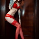 Razor Candi in 'Redhead Valentine in red lingerie with anal-beads and cuffs'
